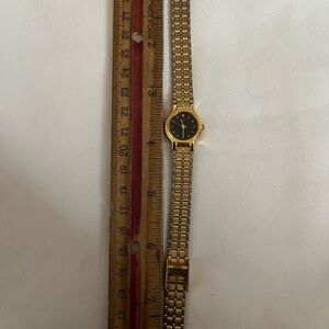 Gold and Black seiko Wristwatch